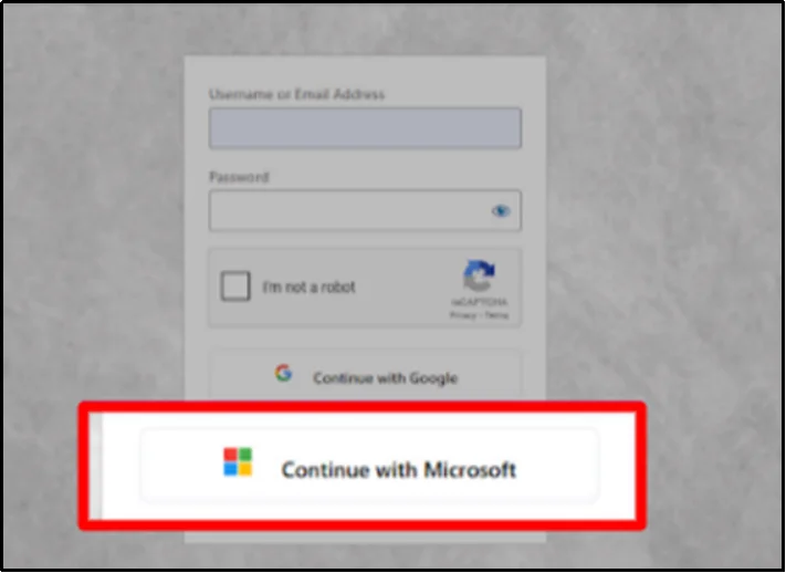 Screenshot showing the Microsoft social login button active on the login page